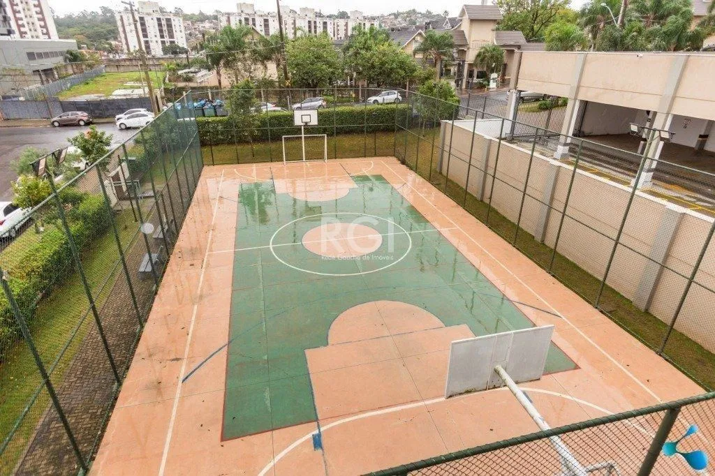 Imagem Vende apartamento, 03 dormitórios, living para dois ambientes, banheiro social, cozinha com churrasqueira e área de serviço e garagem.