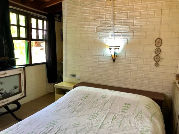 Imagem Oportunidade única: Casa dos sonhos em Garopaba com edícula e jardim exuberante!
