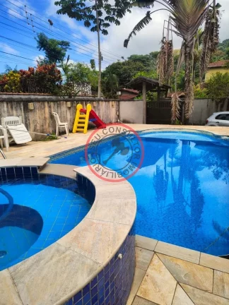 Imagem CASA A VENDA EM CAMBURI, 3 DORMITORIOS, SENDO 2 SUITES COM PISCINA