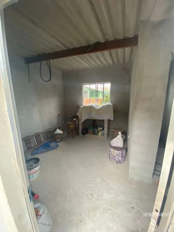 Imagem Terreno com 3 Casas com 3 vagas de carro e moto.