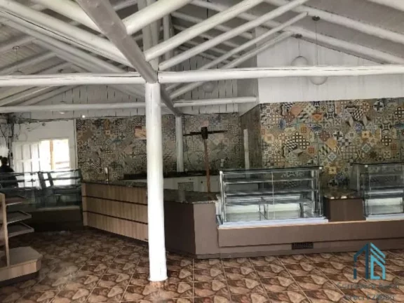 Imagem Área com 10.213m², com casa 03 quartos, localizada em Campina Grande do Sul PR, com frente para os 02 lados da Rodovia Régis Bintencourt