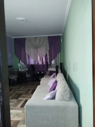 Imagem Venha conhecer a sua nova casa dos sonhos! Localizada em um bairro tranquilo e residencial, esta lin...