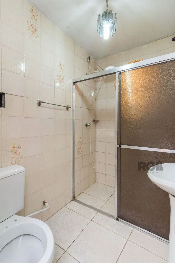 Imagem Casa de 4 dormitórios no bairro Camaquã