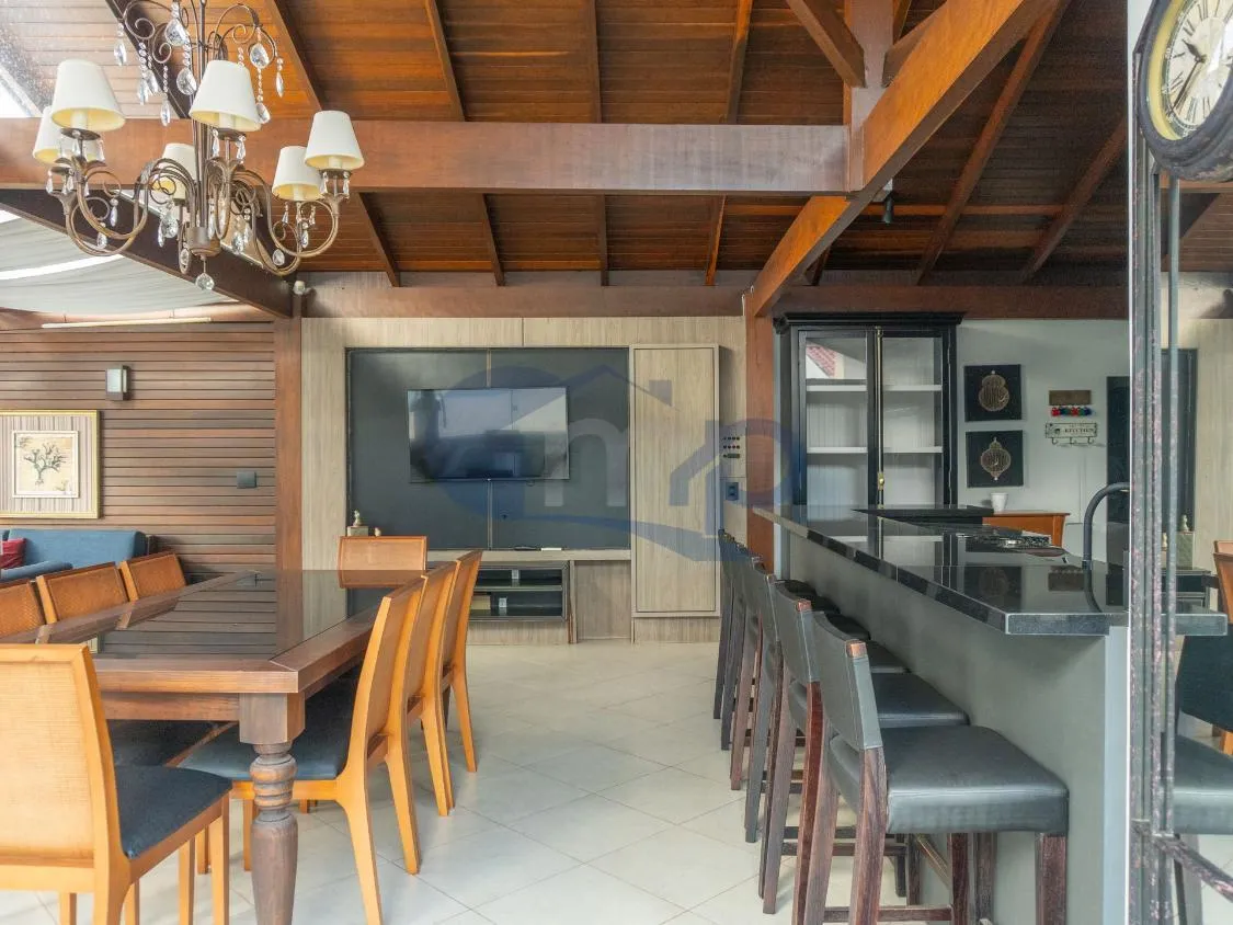 Imagem Casa de Alto Padrao com 4 Dormitorios, Piscina Aquecida e Espaço Gourmet no Centenario, em Torres/RS