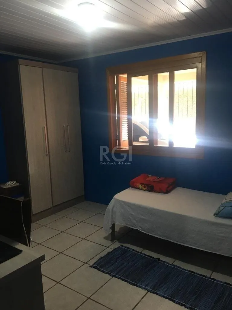 Imagem Sobrado para Venda - 92m², 3 dormitórios, 2 vagas - Restinga Nova