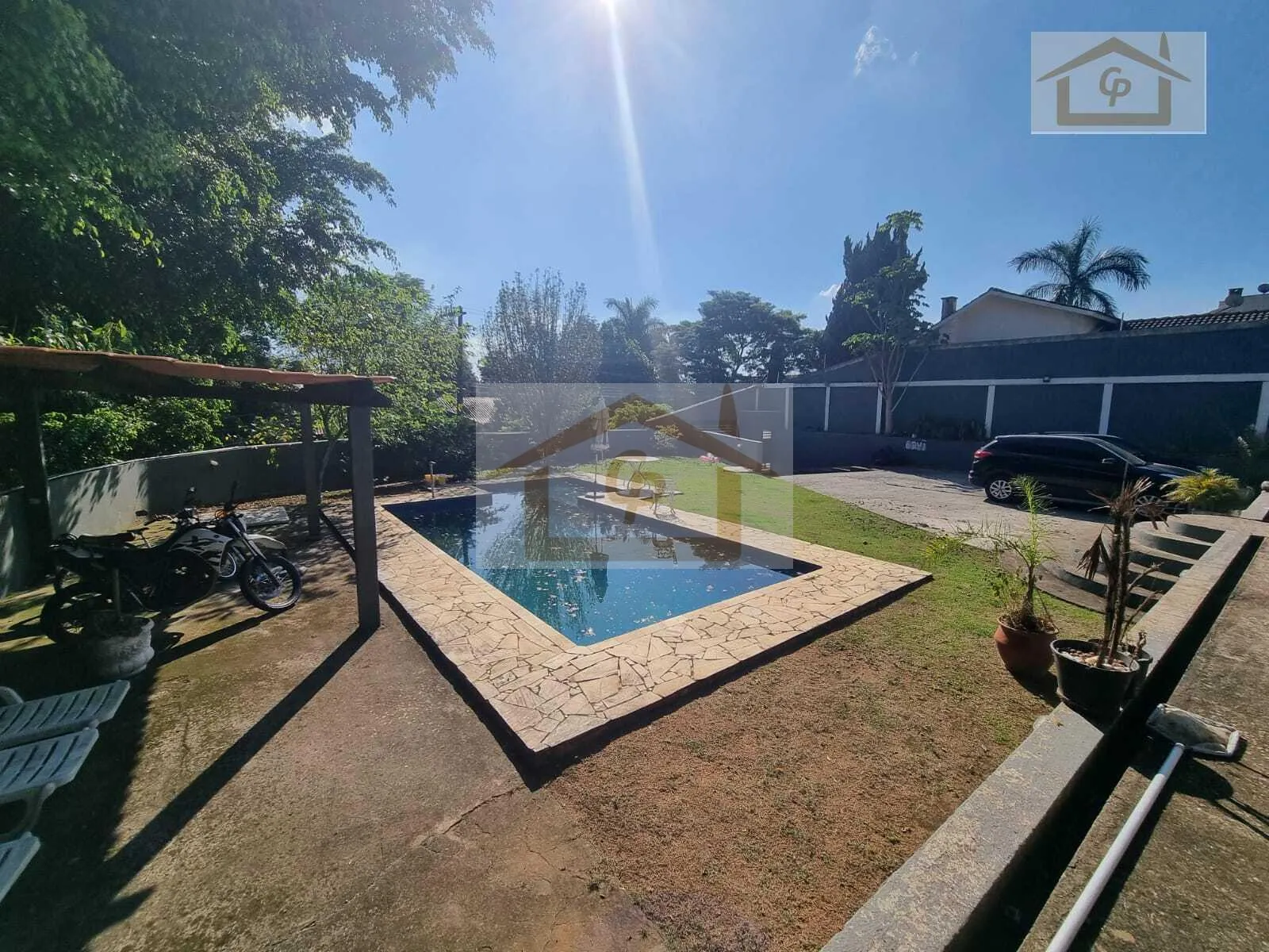 Imagem Casa com 4 dormitórios e piscina em terreno de 940 metros