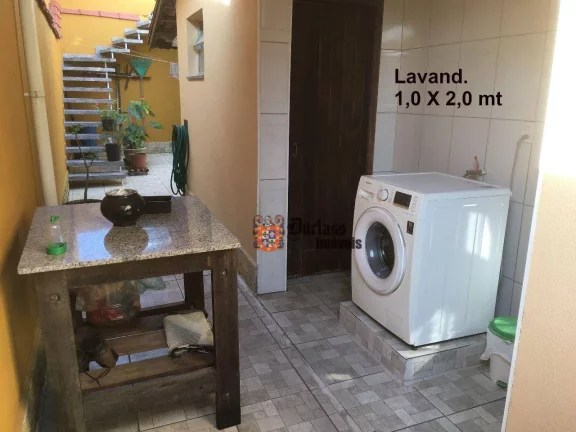 Imagem Casa com 3 dormitórios à venda, 180 m² por R$ 1.100.000 - Vila Guilhermina - Praia Grande/SP