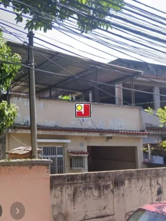Imagem Vendo casa em Olaria, ótima rua, excelente ponto, preço baixinho, 210m² de terreno e 117m² construídos, piso cerâmica, comércio próximo .
