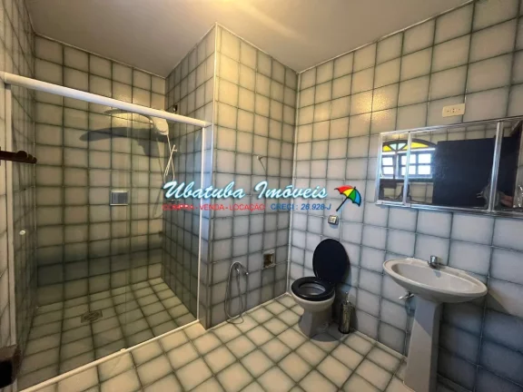 Imagem Sobrado com 03 dormitórios em excelente localização