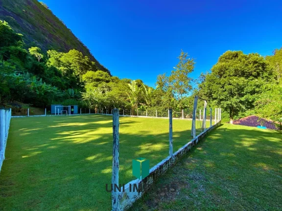 Imagem Chácara com 10 suítes e Cachoeira a venda, 9.104M² na zona rural de Guarapari.