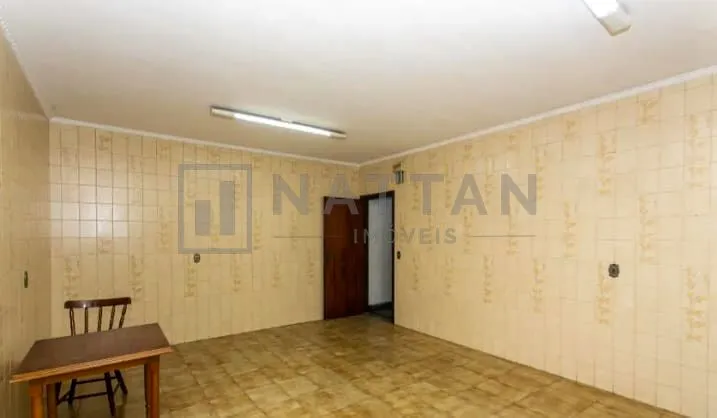 Imagem Casa à venda com 3 dormitórios, 4 banheiros, salão de festas e terreno de 208 m²