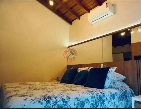 Imagem ESCRITURA DEFINITIVA, CASA DENTRO DE CONDOMÍNIO, TODA MOBILIADA A 50 METROS DA PRAIA, COM PISCINA PRIVATIVA E ÁREA GOURMET