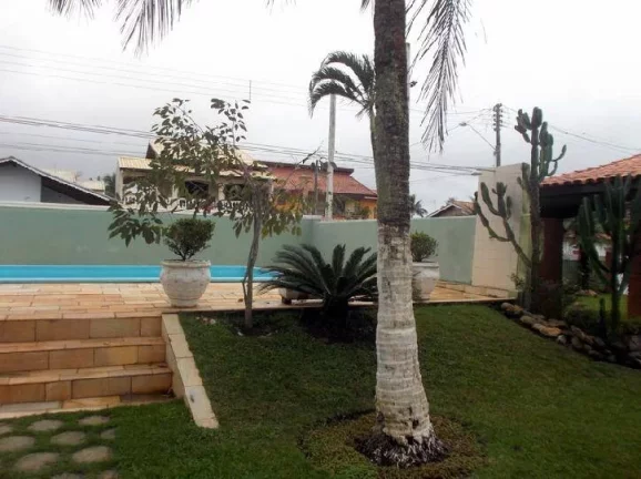 Imagem CASA LADO PRAIA EM TRES LOTES COM PISCINA