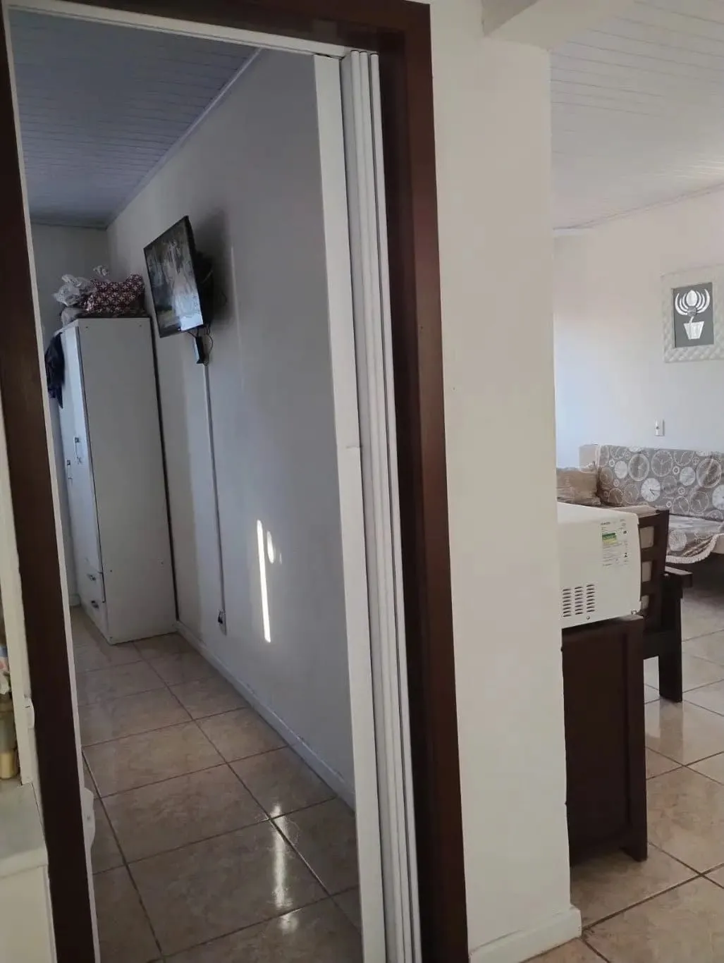 Imagem Casa de 3 dormitórios e 111m² à venda em Jardim Botânico, Porto Alegre.