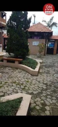 Imagem Triplex com 3 dormitórios à venda, 112 m² por R$ 440.000 - Jardim Três Marias - Guarujá/SP