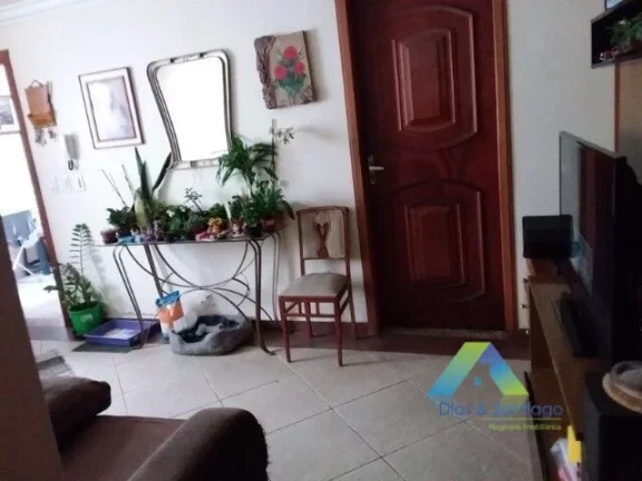 Foto do imóvel Sobrado com 2 dormitórios à venda, 130 m² por R$ 489.000 - Vila das Mercês