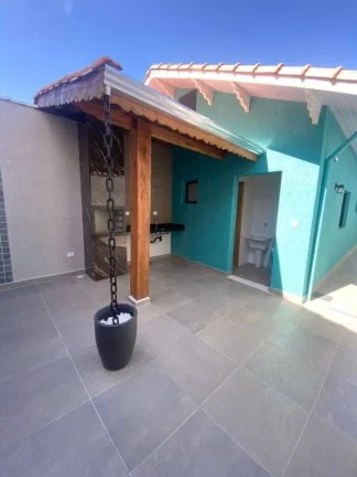 Imagem Casa com 2 dormitórios à venda, 88 m² por R$ 620.000,00 - Aviação - Praia Grande/SP