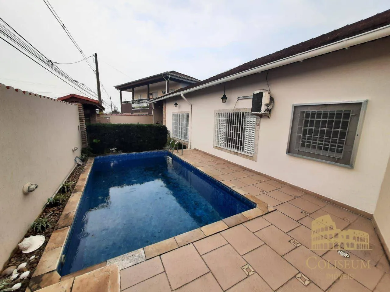 Foto do imóvel Casa com 2 dormitórios à venda, 80 m² por R$ 555.000,00 - Vilamar - Praia Grande/SP