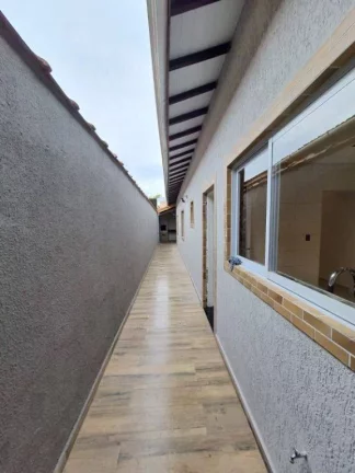 Imagem Casa com 2 dormitórios à venda, 74 m² por R$ 470.000,00 - Caiçara - Praia Grande/SP