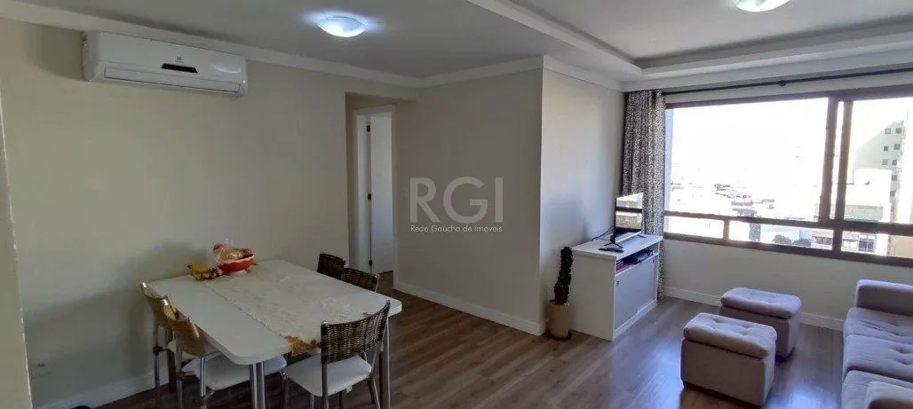 Imagem Excelente, amplo e ensolarado apartamento 3 dormitórios sendo 1 suíte, com living 2 ambientes, banheiro social, semimobiliado e com 2 vagas de garagem.