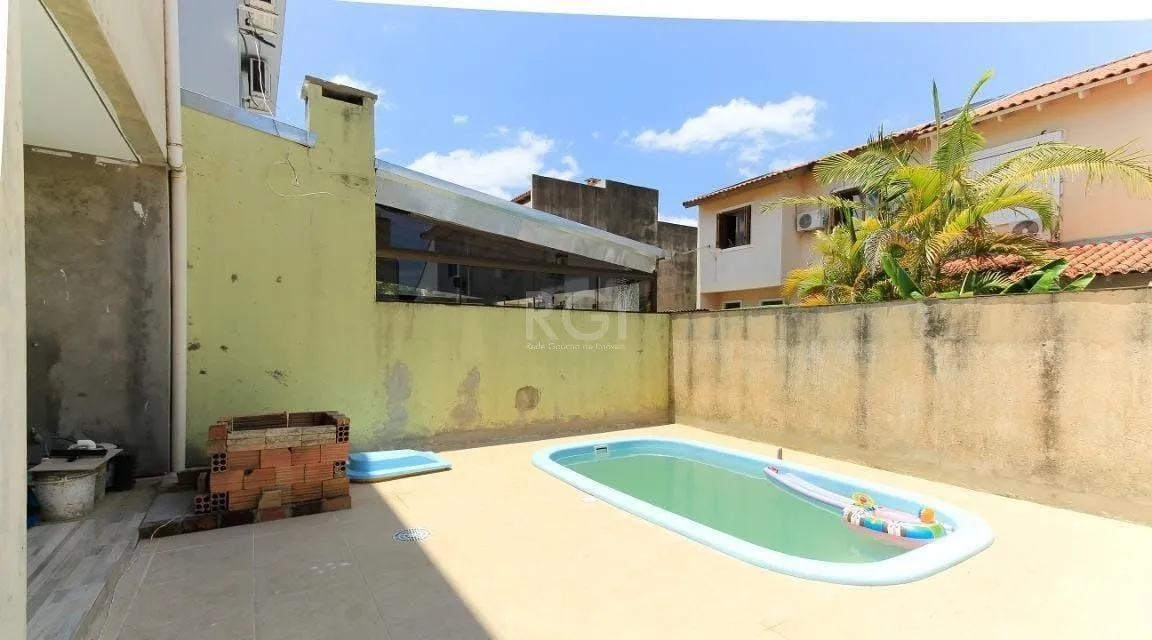 Imagem Casa no bairro Hípica - 3 dormitórios