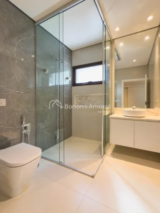 Imagem Casa de alto padrão à venda no Alphaville Campinas, com 4 suítes, ambientes amplos e excelente im...