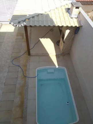 Imagem Belíssima casa duplex composta de 3 suítes área de lazer com piscina e churrasqueira em finíssimo acabamento.