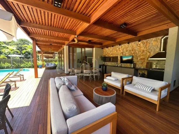 Imagem Com ambientes amplos e moderno essa casa decorada com quatro suítes e área gourmet a venda na Praia do Forte