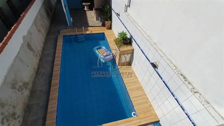 Imagem Espaçosa Casa Geminada no Mirim Praia Grande – 2 Quartos e Piscina