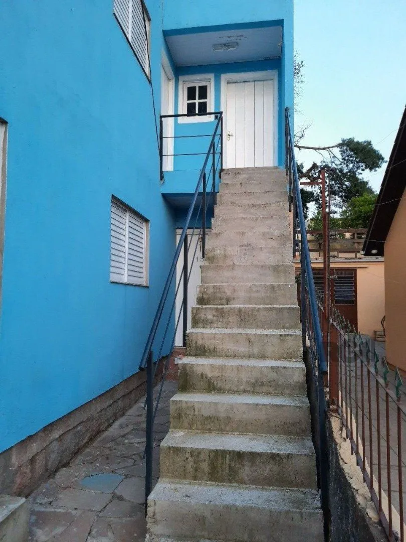 Imagem Oportunidade Imperdível: Prédio com 4 Apartamentos, Pátio e 2 Vagas de Garagem