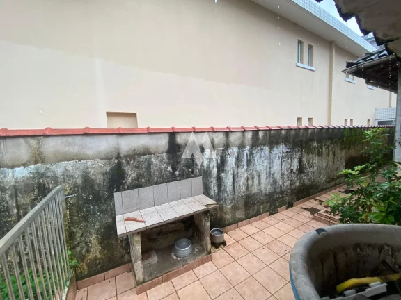 Imagem Casa à venda com 3 dormitórios e edícula no bairro Aparecida de Santos/SP