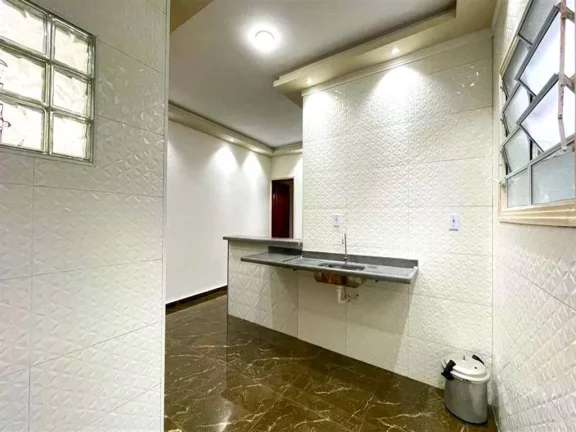Imagem Casa com 2 dormitórios à venda, 130 m² por R$ 400.000 - Caiçara - Praia Grande/SP