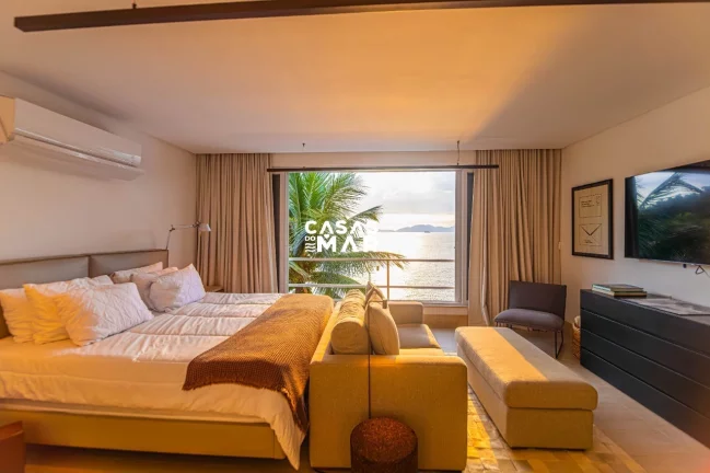 Imagem Casa Luxuosa Frente Mar em Tanguá, Angra dos Reis-RJ: 6 suítes, praia particular e deck para embarcações.