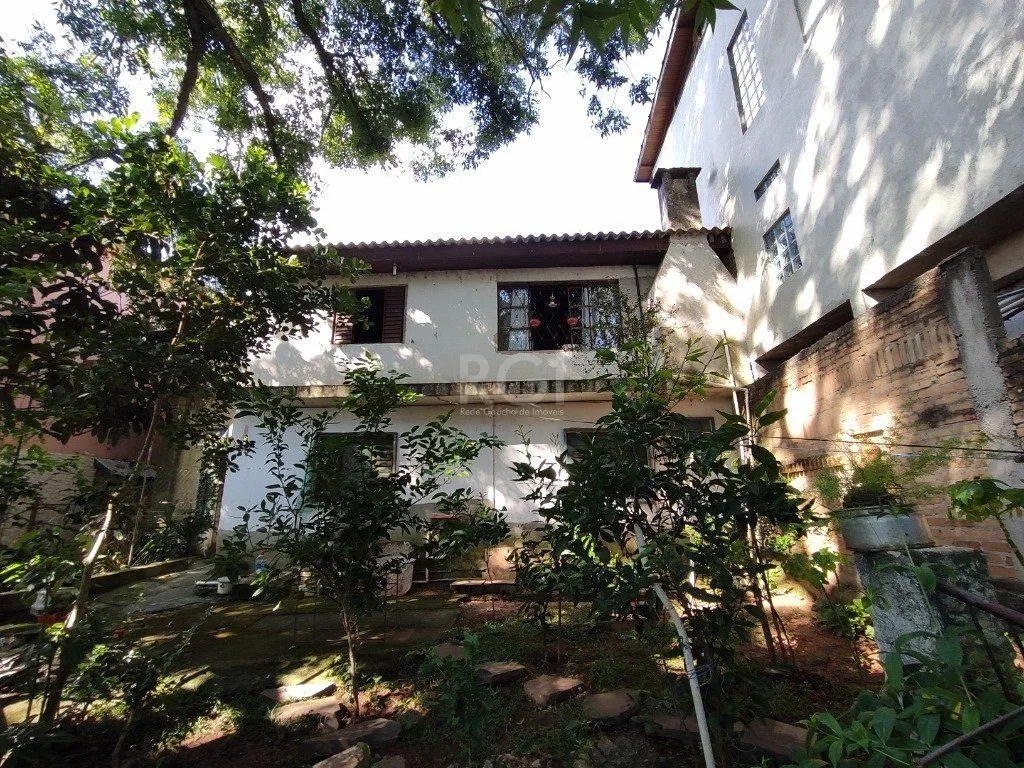 Imagem Casa para Venda - 134m², 2 dormitórios, 1 vaga - Nonoai