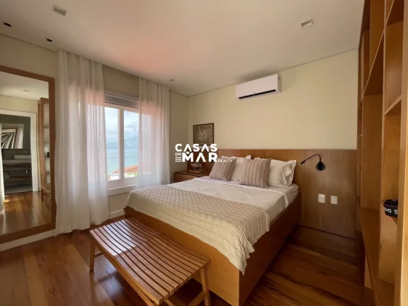 Imagem Casa de Luxo à Beira-Mar em Condomínio na Vila Velha, Angra dos Reis-RJ: 6 Quartos, 6 Suítes, 7 Salas e 7 Banheiros.