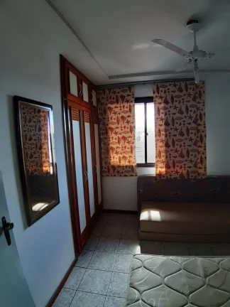 Imagem Apartamento composto de 2 Quartos (1Suíte) Sala de jantar e Estar uma Varandas Cozinha Área de Serviço 1 Vaga de Garagem.