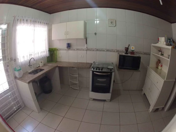Imagem Casa a 50 metros do mar com um belo jardim