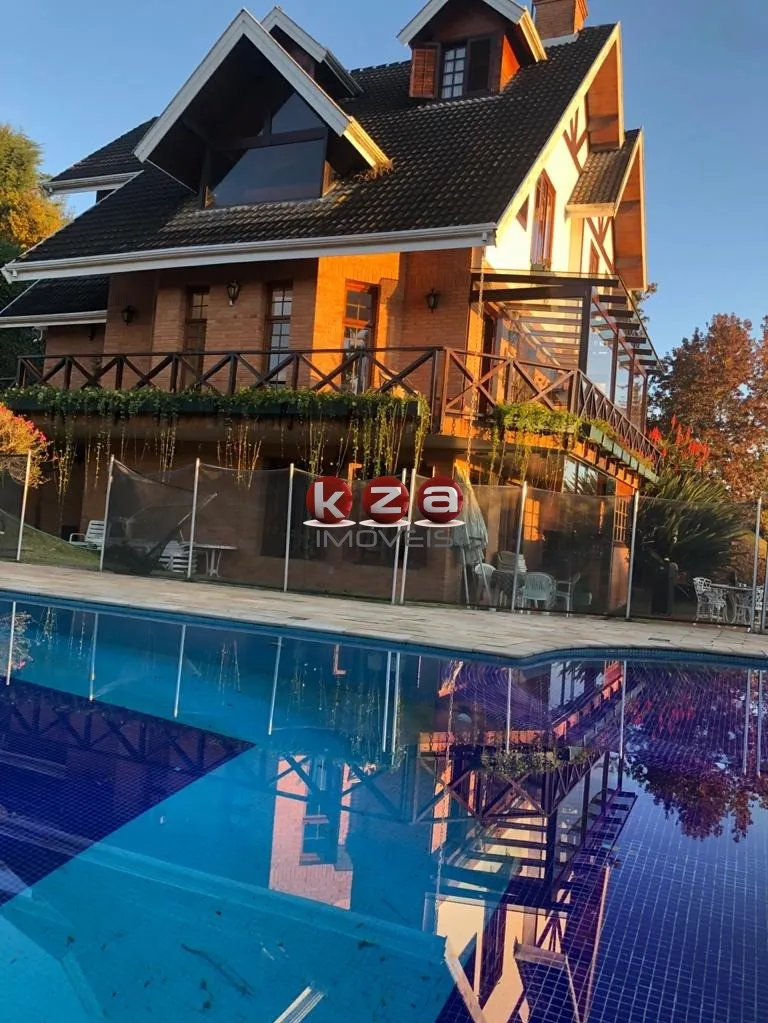 Imagem Casa de luxo em condomínio: 5 quartos, 5 suítes, 4 salas e mais - Venda em Descansópolis, Campos do Jordão-SP