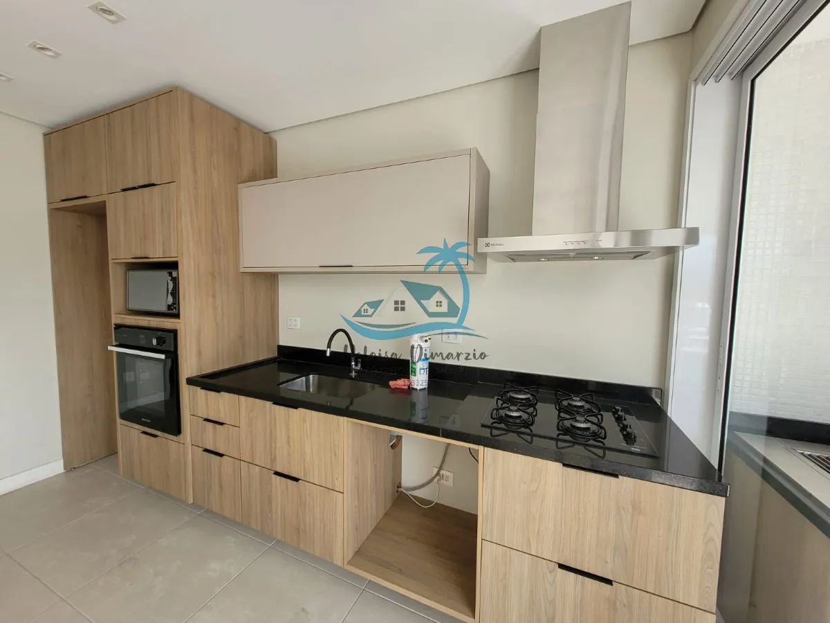 Imagem Excelente Apartamento com 3 dormitórios semi mobiliado e vista para o mar, a venda a 250 metros da orla de Itagua em Ubatuba.