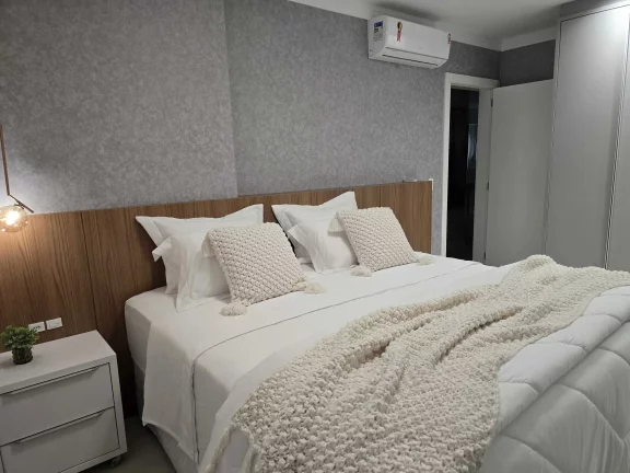 Imagem Apartamento com 3 dormitórios sendo 3 suítes e 2 vagas de garagem em Itapema/SC