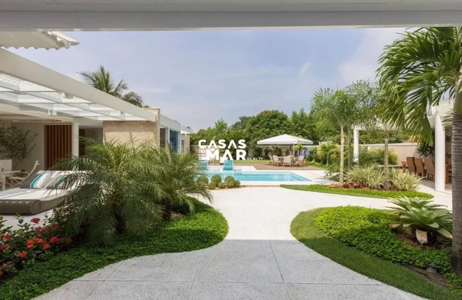 Imagem Imponente mansão de luxo na Barra da Tijúca: 5 quartos, 4 suítes, 3 salas, 7 banheiros, 2 vagas de garagem, 920m² de área. Venda!