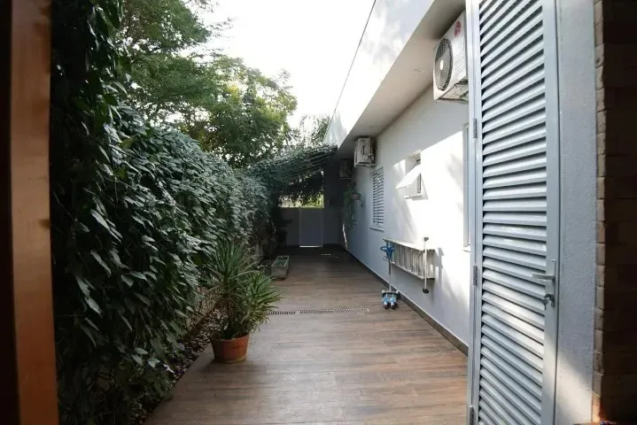 Imagem Casa de Alto Padrão à Venda no Condomínio Palmeiras Imperiais ? 3 Suítes, Piscina Aquecida e Área Gourmet