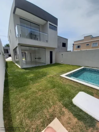 Imagem Casa de luxo em condomínio à venda em Camaçari-BA, Vila de Abrantes: 4 quartos, 4 suítes, 2 salas, 1 banheiro, 3 vagas, 148m².