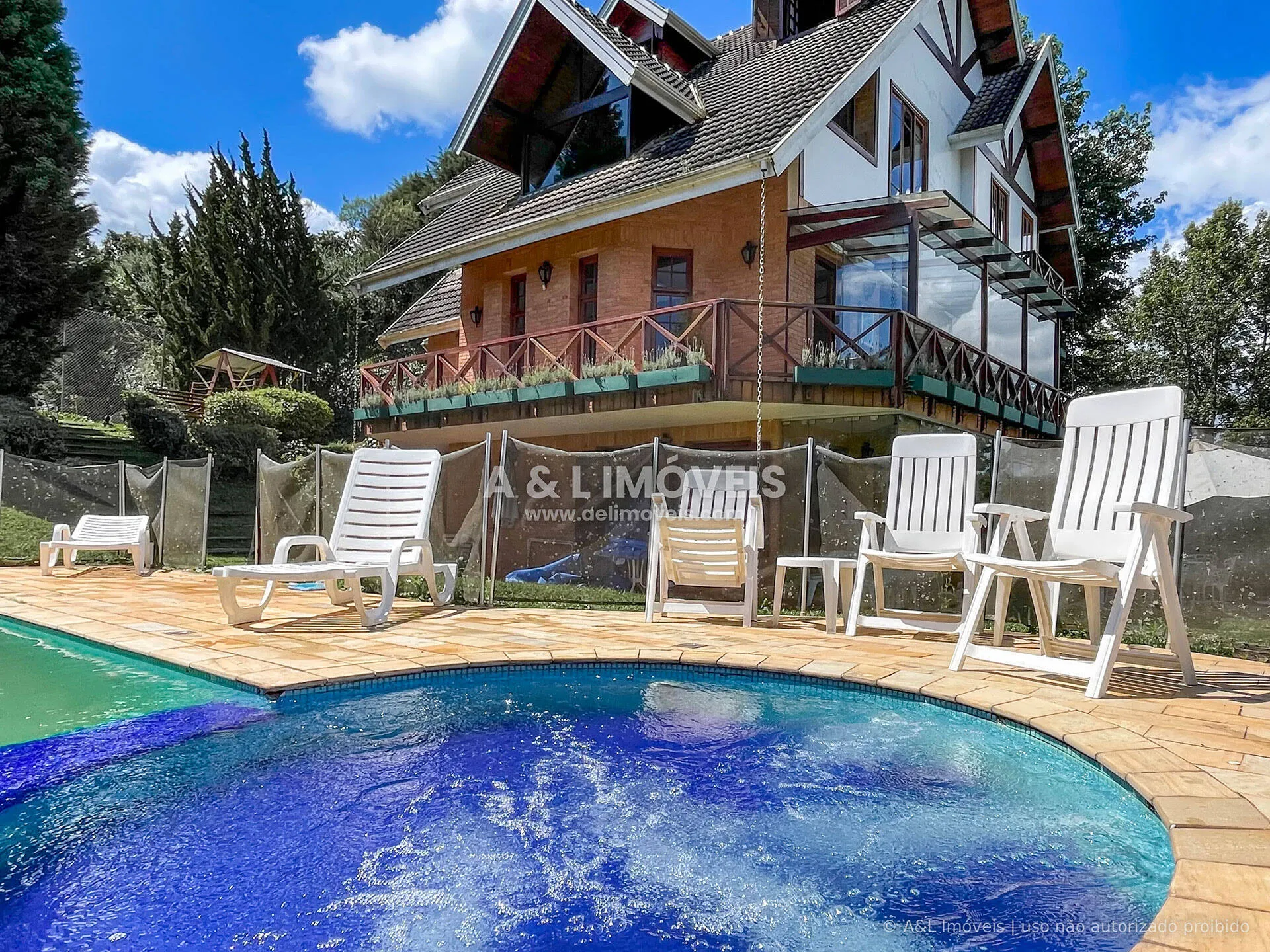 Imagem Casa Condomínio Campos do Jordão | 977 m² | 5 Suítes | Lazer Completo