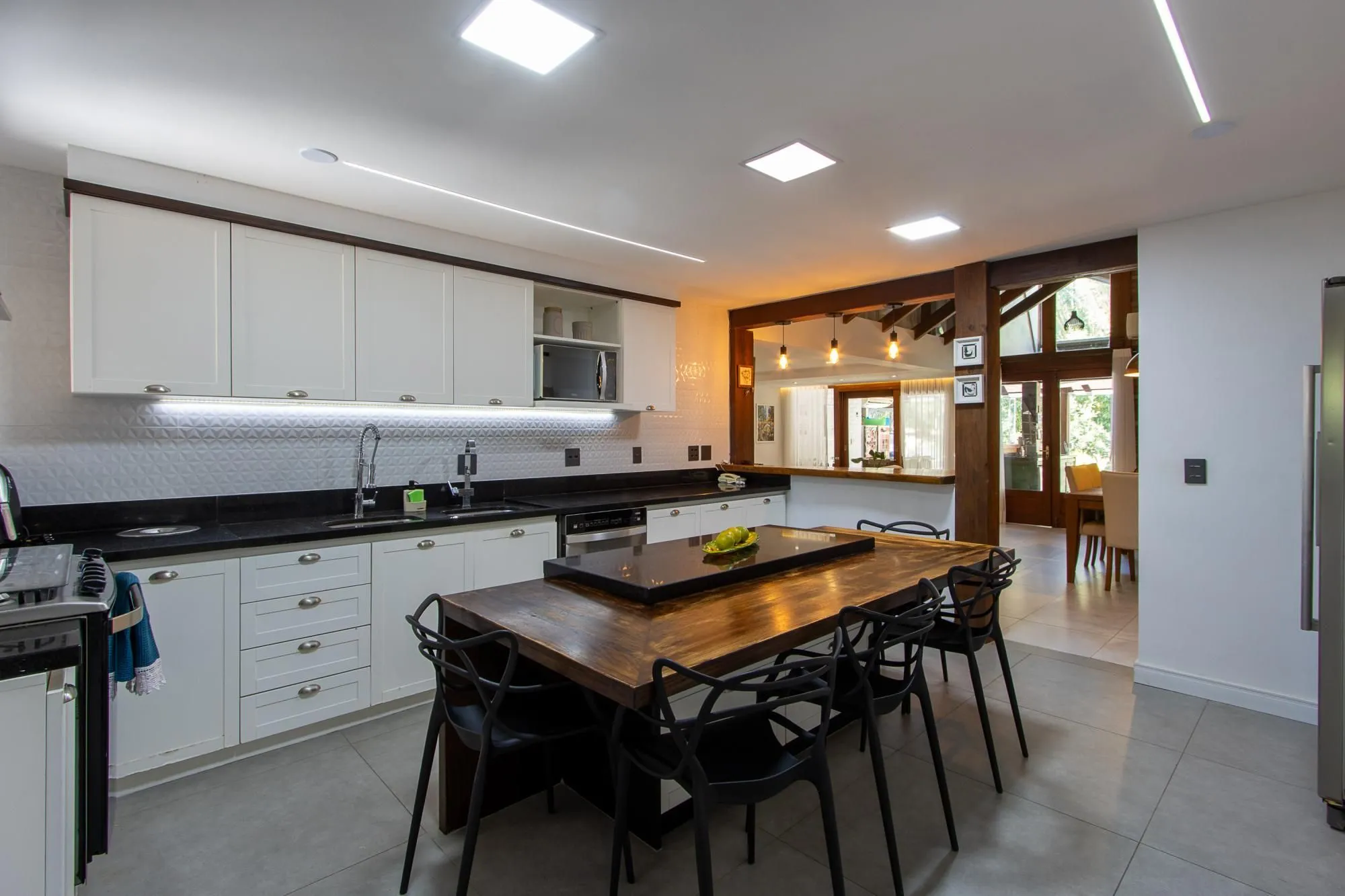 Imagem Casa 4 suites no Terra Ville, com home office, estar íntimo, 4 vagas e piscina.
