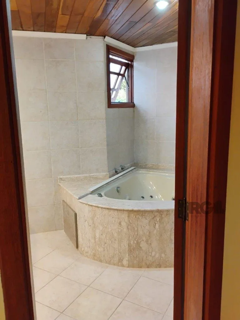 Imagem Casa em condomínio de 166m², 3 suítes 1 vaga do bairro Jardim Isabel