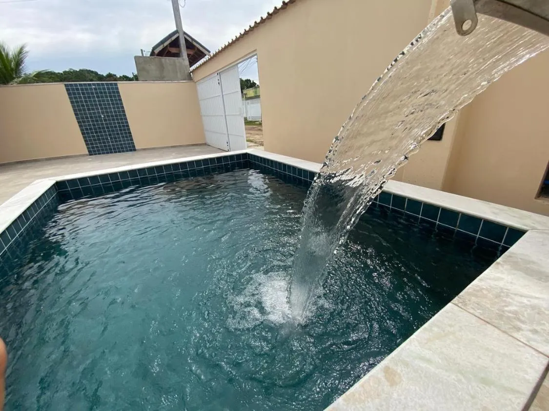 Imagem LINDA CASA NOVA COM PISCINA A 700 METROS DO MAR NO CIBRATEL II