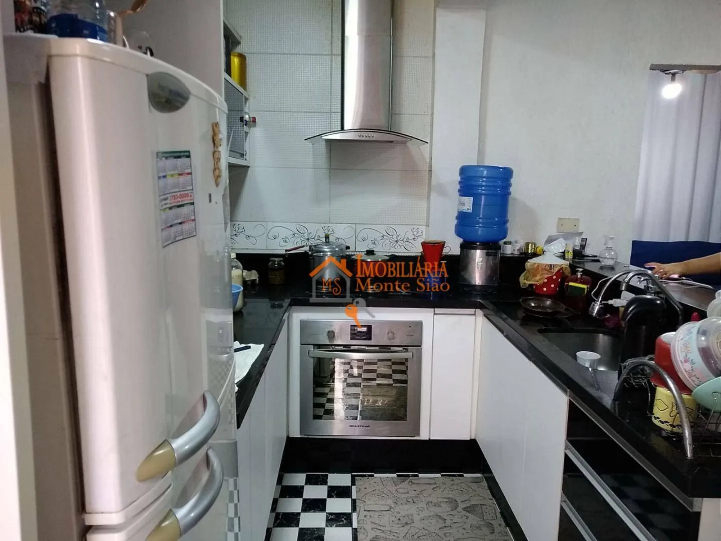 Imagem Sobrado com 4 dormitórios à venda, 300 m² por R$ 650.000,00 - Cocaia - Guarulhos/SP