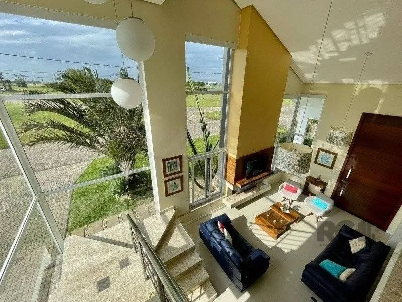 Imagem Casa de Condomínio em Atlântida Sul