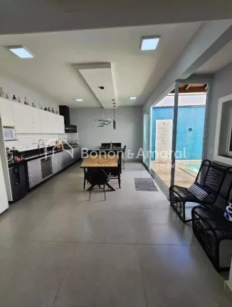 Imagem A casa conta com 3 dormitórios, sendo 1 suíte espaçosa, além de banheiro social e lavabo. As sal...